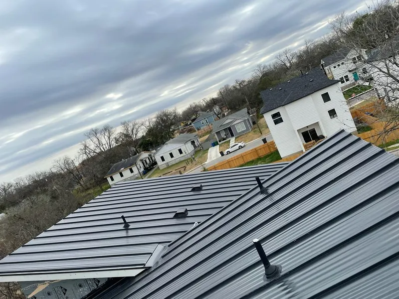 Standing seam metal roof panels with vents for Skylight Repair in Finley